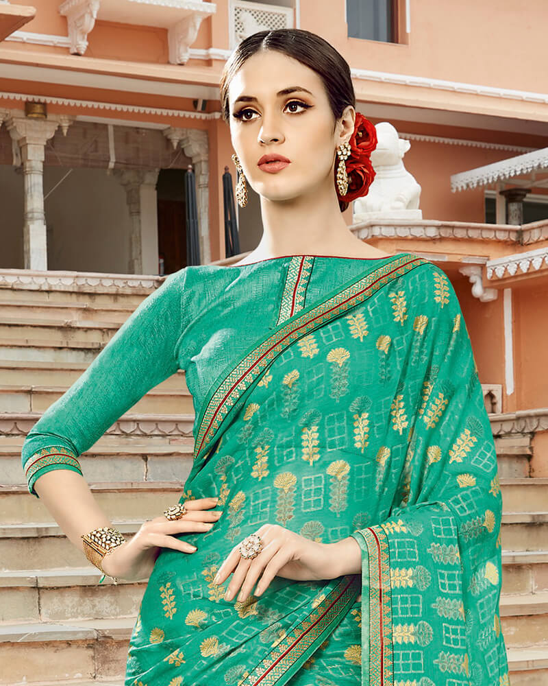 Vishal Prints Sea Green Brasso Saree With Foil Print And Jari Border