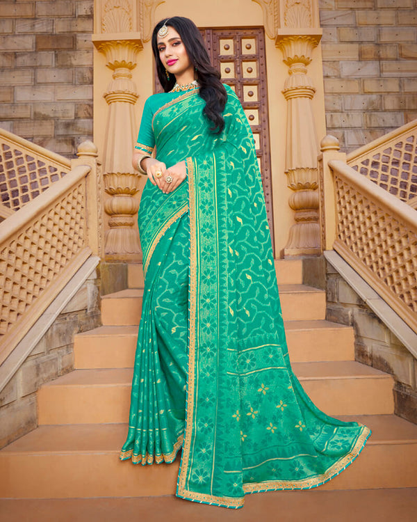 Vishal Prints Aqua Green Brasso Saree With Foil Print And Border