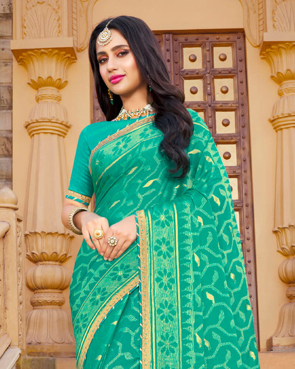 Vishal Prints Aqua Green Brasso Saree With Foil Print And Border