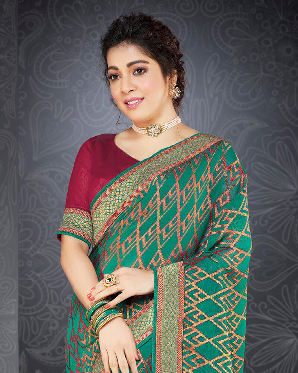 Vishal Prints Teal Green Brasso Saree With Jari Border And Foil Print