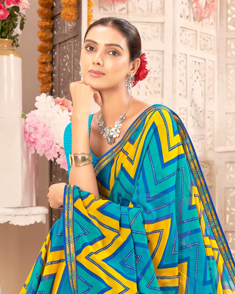 Vishal Prints Dark Teal Blue Printed Weightless Georgette Saree With Foil Print And Zari Border