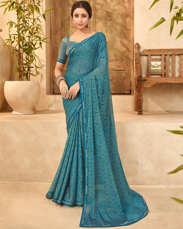 Vishal Prints Peacock Blue Designer Brasso Saree With Fancy Border