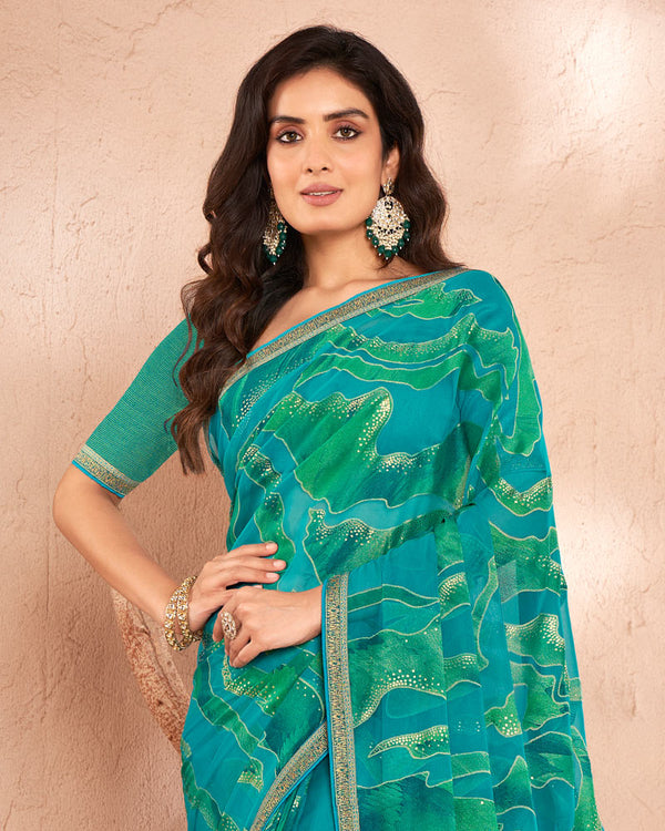 Vishal Prints Teal Blue Printed Chiffon Brasso Saree With Foil Print And Border