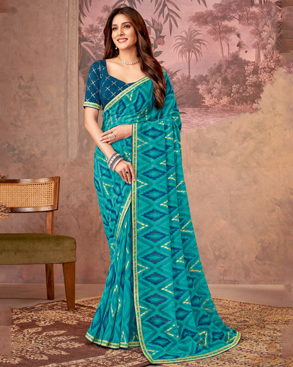 Vishal Prints Teal Blue Printed Georgette Saree With Foil Print And Zari Border