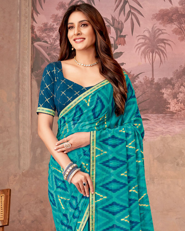 Vishal Prints Teal Blue Printed Georgette Saree With Foil Print And Zari Border