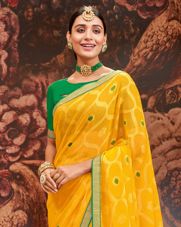 Vishal Prints Yellow Printed Brasso Saree With Zari Border