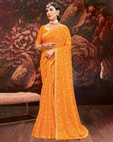 Vishal Prints Yellowish Orange Printed Brasso Saree With Zari Border