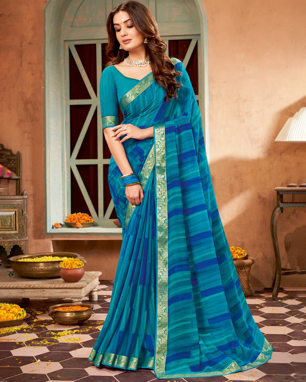 Vishal Prints Teal Blue Printed Georgette Saree With Border