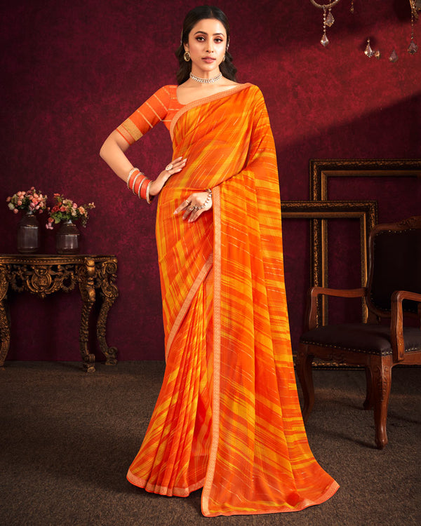 Vishal Prints Dark Orange Fancy Chiffon Saree With Foil Print And Zari Border