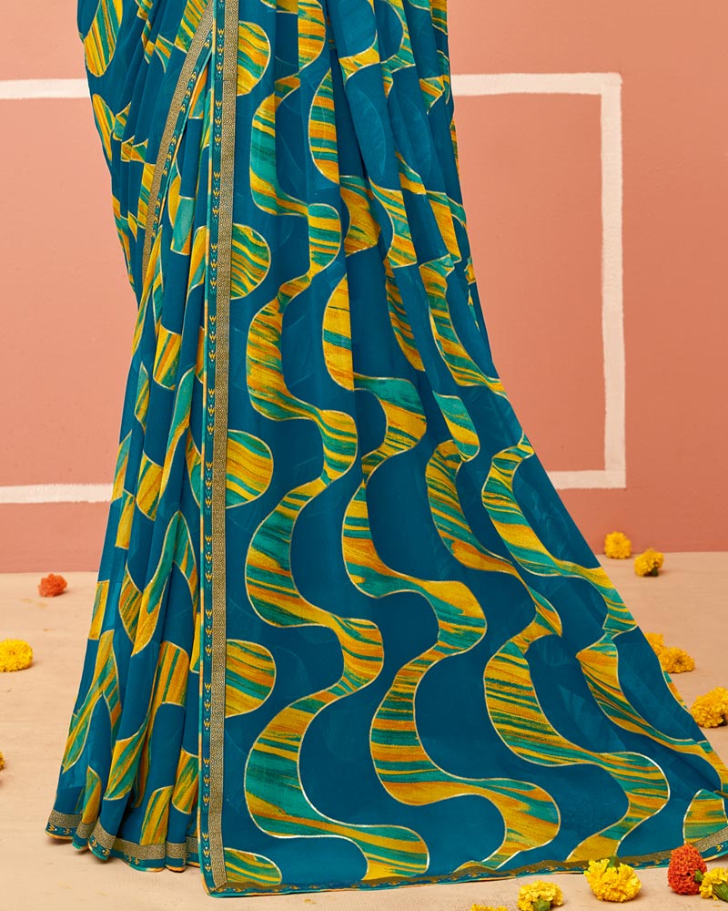 Vishal Prints Peacock Blue Printed Georgette Saree With Foil Print And Fancy Border