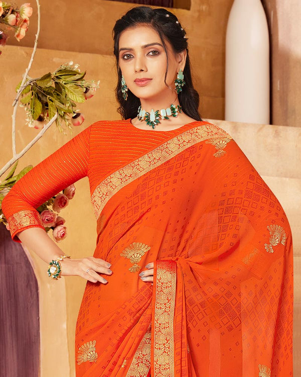 Vishal Prints Dark Orange Georgette Saree With Foil Print And Zari Border