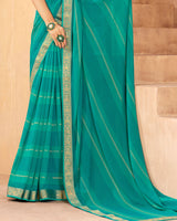 Vishal Prints Aqua Green Georgette Saree With Foil Print And Zari Border