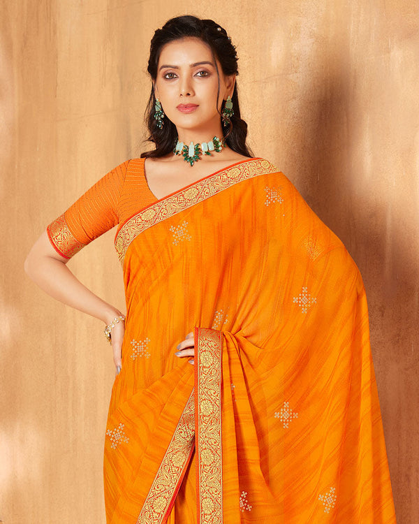 Vishal Prints Orange Georgette Saree With Foil Print And Zari Border