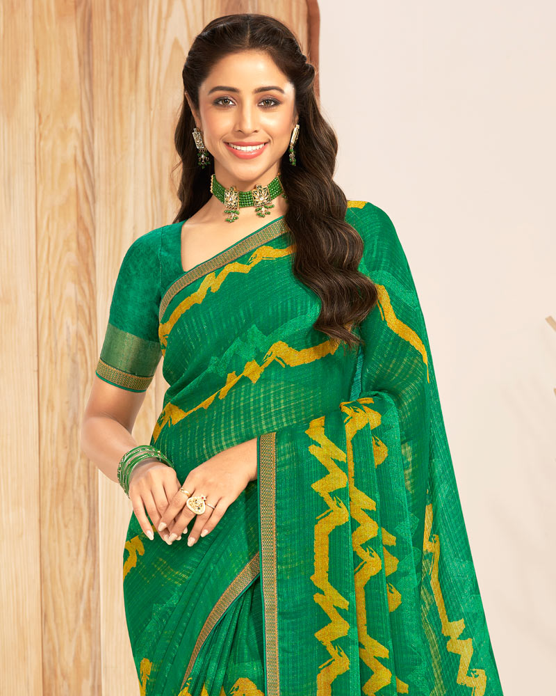 Vishal Prints Dark Green Patterned Chiffon Printed Saree With Foil Print And Zari Border