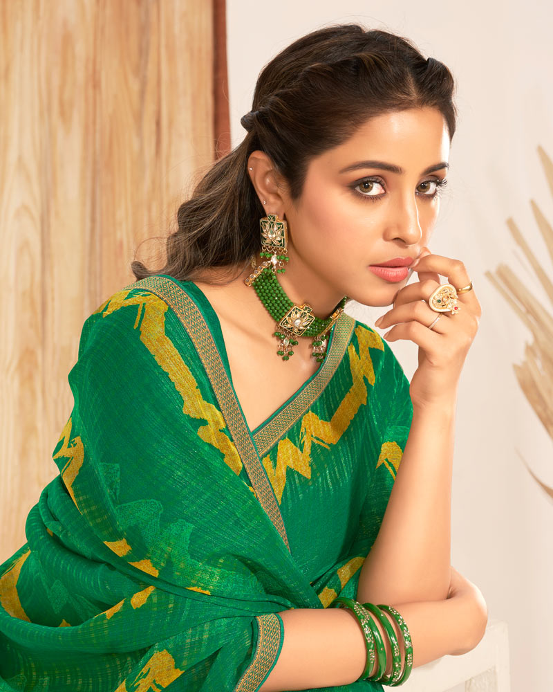 Vishal Prints Dark Green Patterned Chiffon Printed Saree With Foil Print And Zari Border