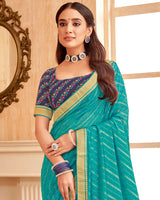 Vishal Prints Teal Blue Printed Georgette Saree With Foil Print And Zari Border