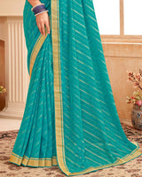 Vishal Prints Teal Blue Printed Georgette Saree With Foil Print And Zari Border