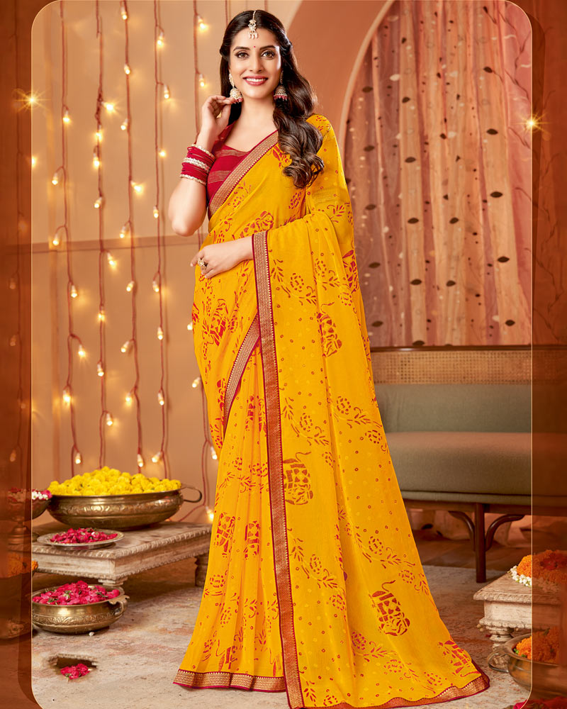 Vishal Prints Yellowish Orange Dyed Chiffon-Brasso Saree With Zari Border