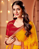 Vishal Prints Yellowish Orange Dyed Chiffon-Brasso Saree With Zari Border