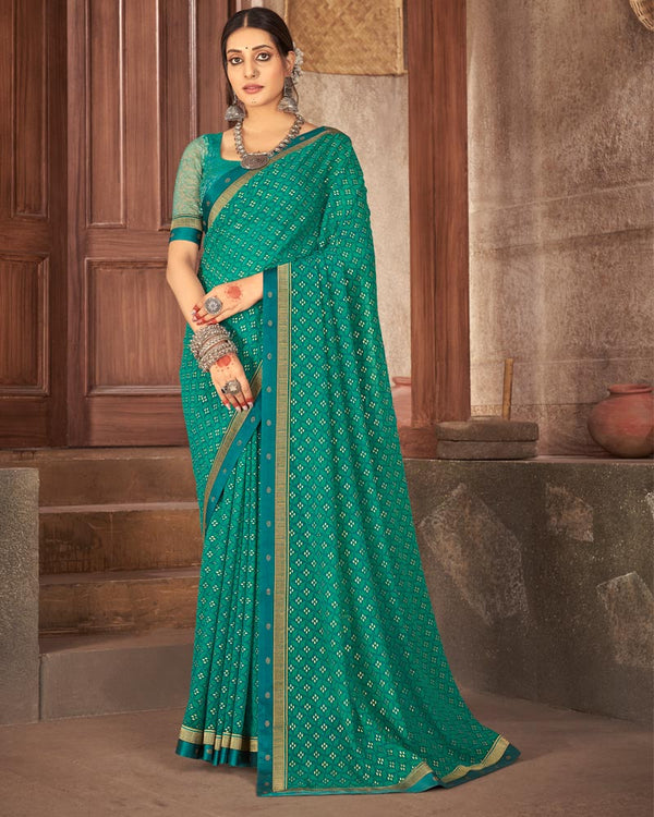 Vishal Prints Teal Blue Georgette Saree With Foil Print And Zari Border