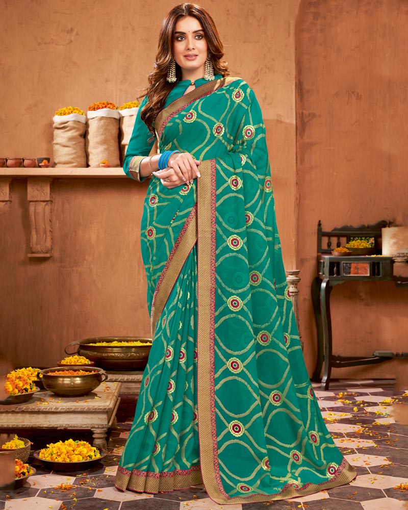 Vishal Prints Teal Green Printed Brasso Saree With Foil Print And Fancy Border