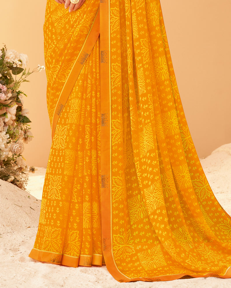 Vishal Prints Yellowish Orange Printed Chiffon Saree With Fancy Border