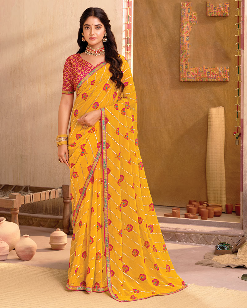 Vishal Prints Dark Yellow Printed Georgette Saree With Foil Print And Fancy Border