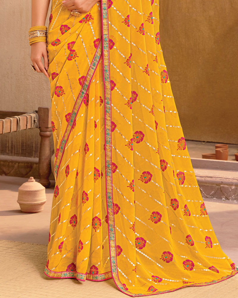 Vishal Prints Dark Yellow Printed Georgette Saree With Foil Print And Fancy Border