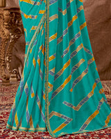 Vishal Prints Dark Turquoise Blue Printed Georgette Saree With Foil Print And Fancy Border