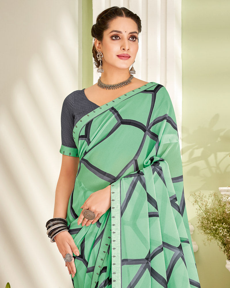 Vishal Prints Light Teal Green Printed Georgette Saree With Fancy Border