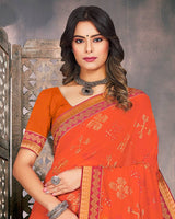 Vishal Prints Dark Orange Georgette Saree With Foil Print And Zari Border