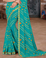 Vishal Prints Teal Blue Printed Chiffon Bandhani Print Saree With Foil Print And Cut Work Embroidery Border