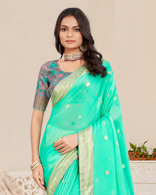 Vishal Prints Light Aqua Green Designer Georgette Saree With Viscose Lining, Foil Work And Zari Weaving