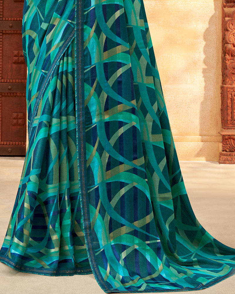 Vishal Prints Dark Teal Blue Printed Patterned Brasso Saree With Fancy Border