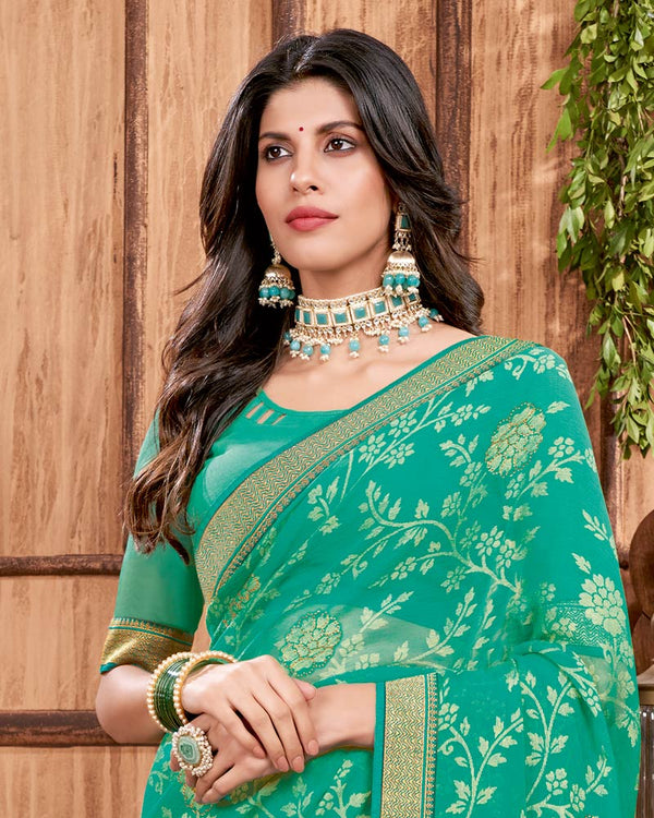 Vishal Prints Aqua Green Brasso Saree With Stone Work And Zari Border