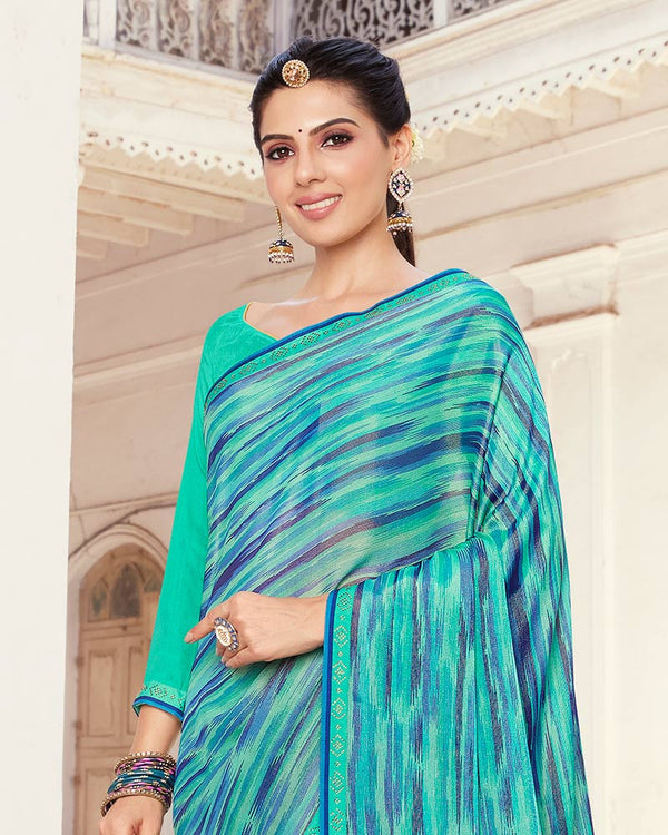 Vishal Prints Turquoise Green Printed Brasso Saree With Fancy Border