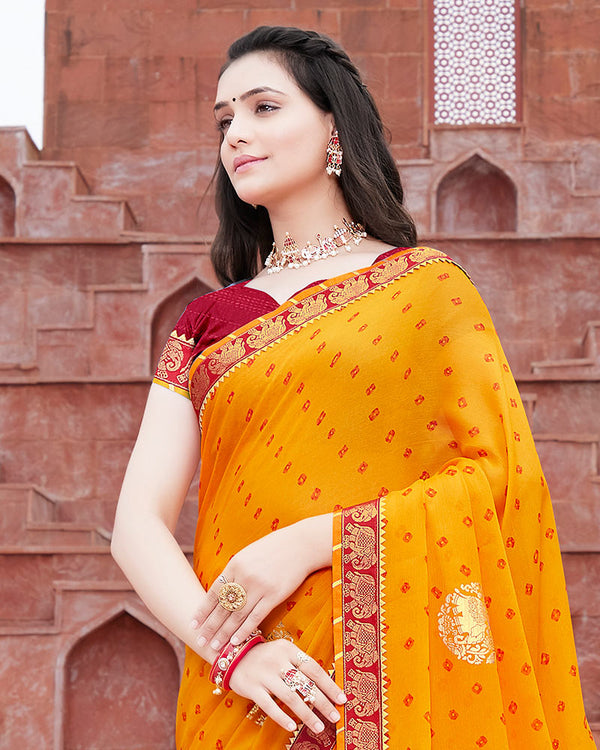 Vishal Prints Yellowish Orange Printed Chiffon Saree With Foil Print And Border