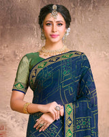 Vishal Prints Navy Blue Fancy Brasso Saree With Foil Print And Zari Border