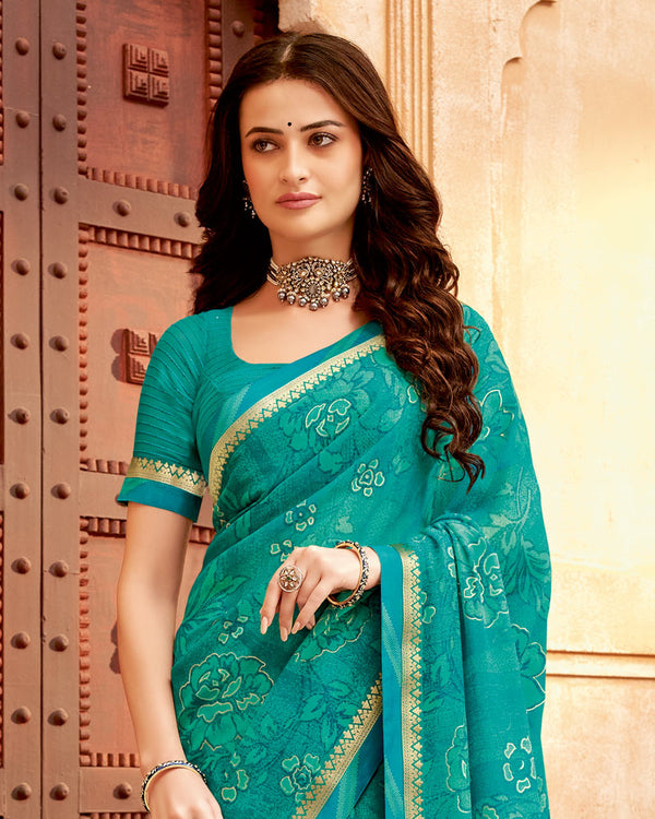 Vishal Prints Teal Green Printed Georgette Saree With Foil Print And Zari Border