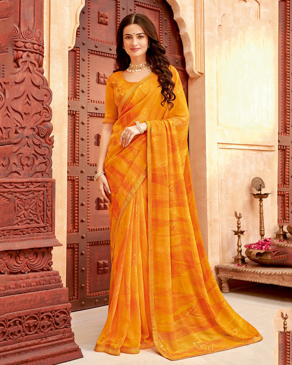 Vishal Prints Saffron Color Printed Georgette Saree With Foil Print And Zari Border