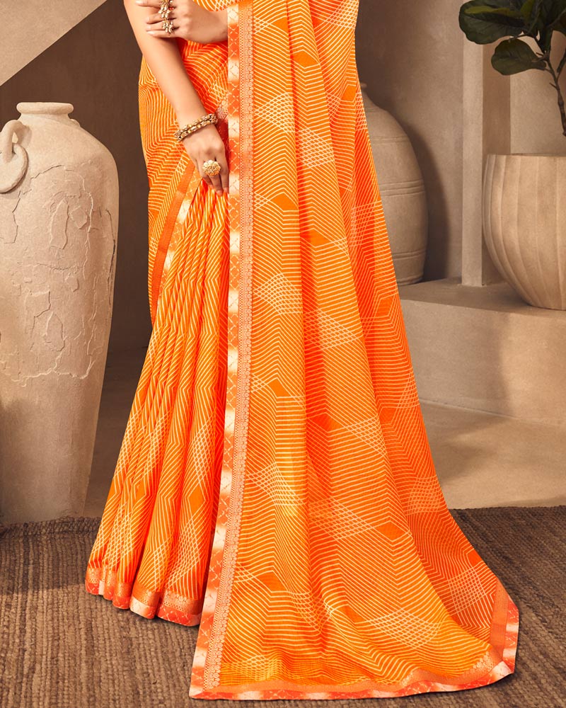 Vishal Prints Orange Printed Chiffon Saree With Fancy Border