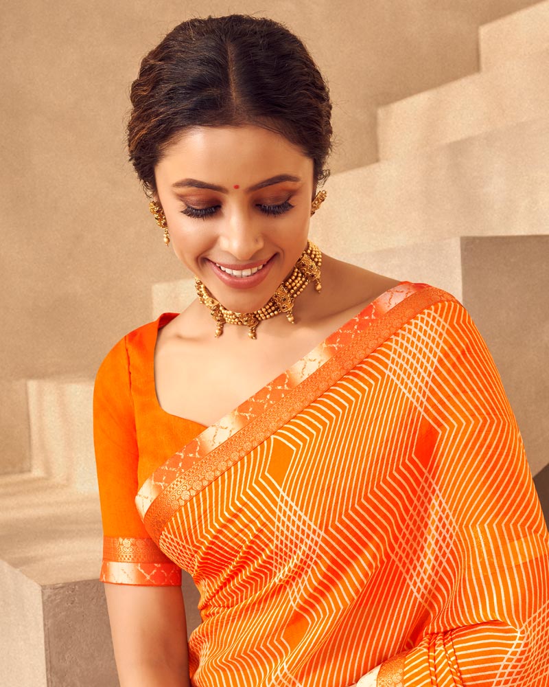 Vishal Prints Orange Printed Chiffon Saree With Fancy Border