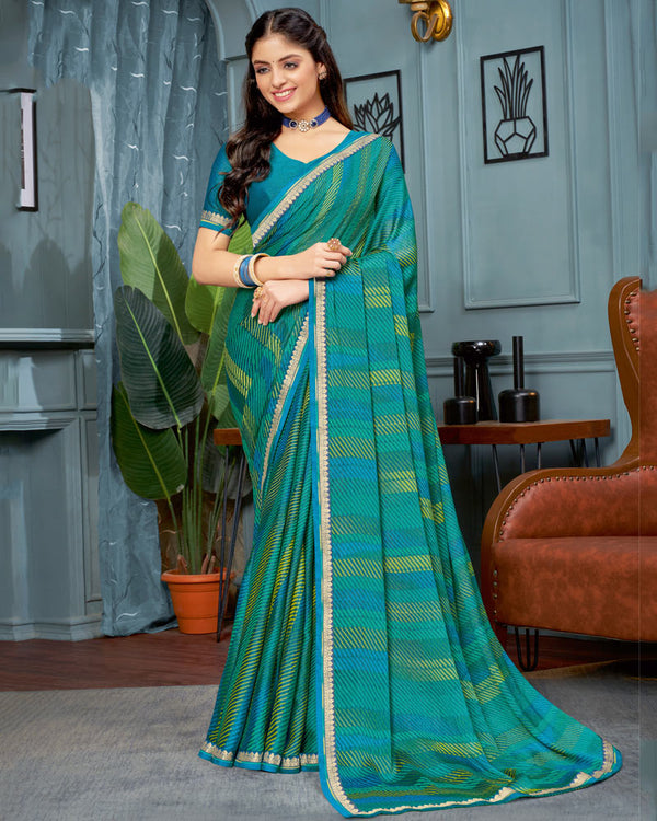 Vishal Prints Teal Blue Printed Brasso Saree With Fancy Border