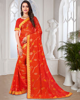 Vishal Prints Dark Orange Georgette Saree With Foil Print And Zari Border