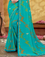 Vishal Prints Dark Turquoise Blue Printed Georgette Saree With Foil Print And Fancy Border