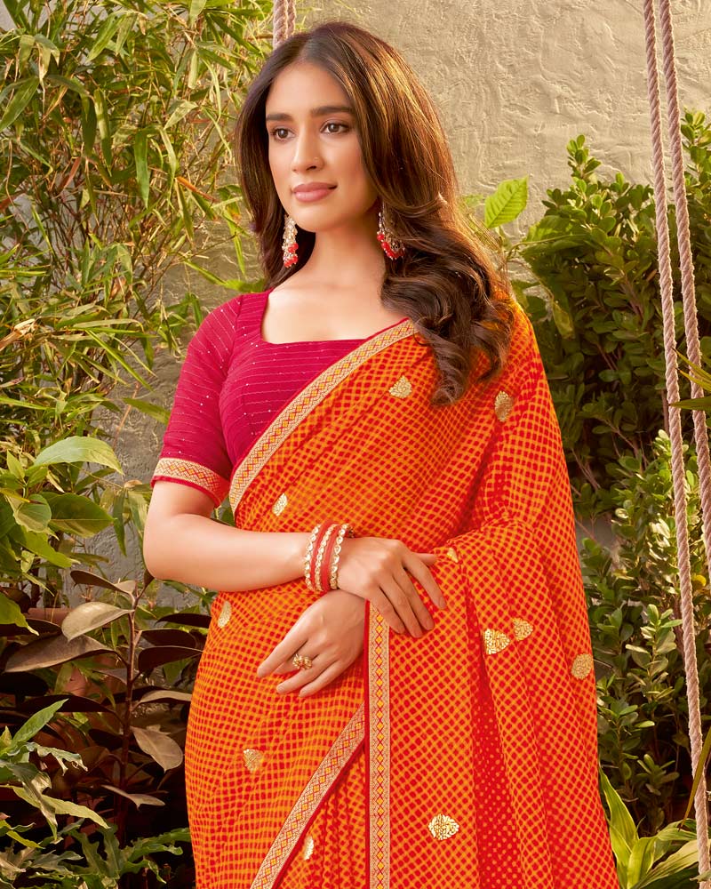 Vishal Prints Orange Bandhani Print Chiffon Saree With Zari Border