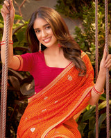 Vishal Prints Orange Bandhani Print Chiffon Saree With Zari Border