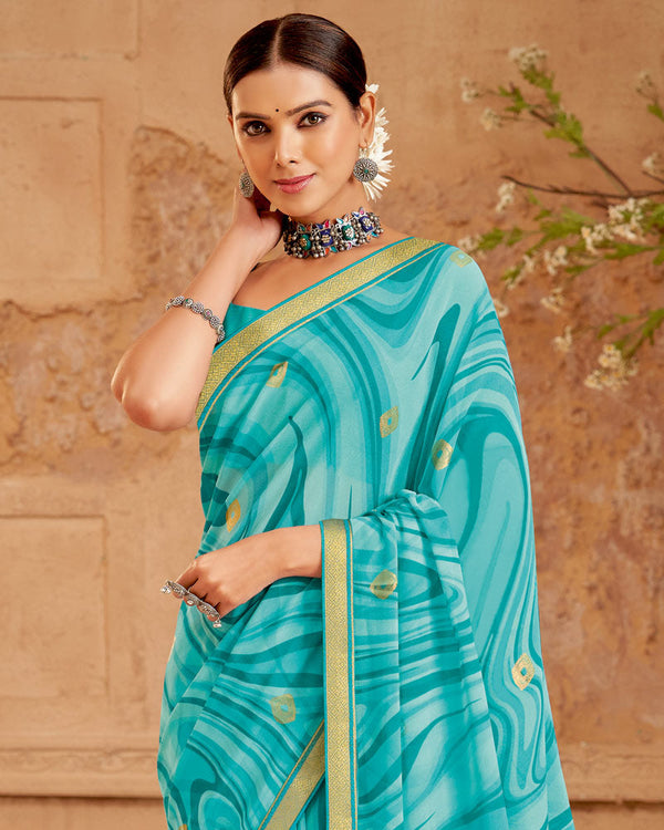 Vishal Prints Pastel Teal Green Printed Georgette Saree With Foil Print And Zari Border