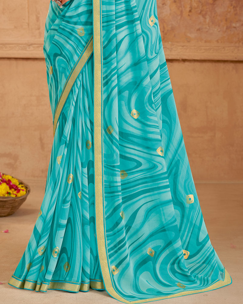 Vishal Prints Pastel Teal Green Printed Georgette Saree With Foil Print And Zari Border