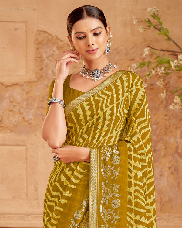 Vishal Prints Dark Mustard Printed Georgette Saree With Foil Print And Zari Border